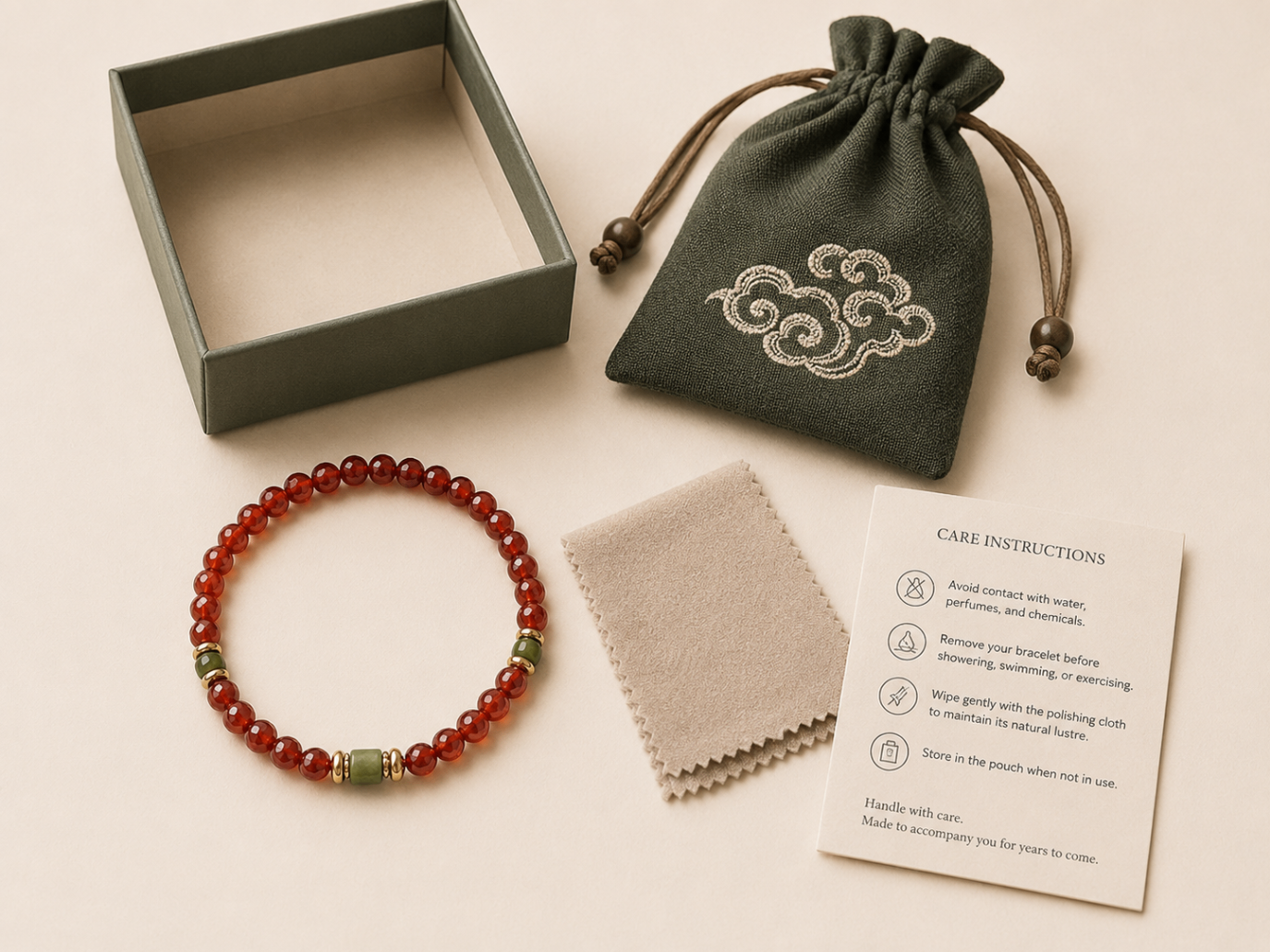 YukDao presentation box, embroidered pouch, polishing cloth and care card