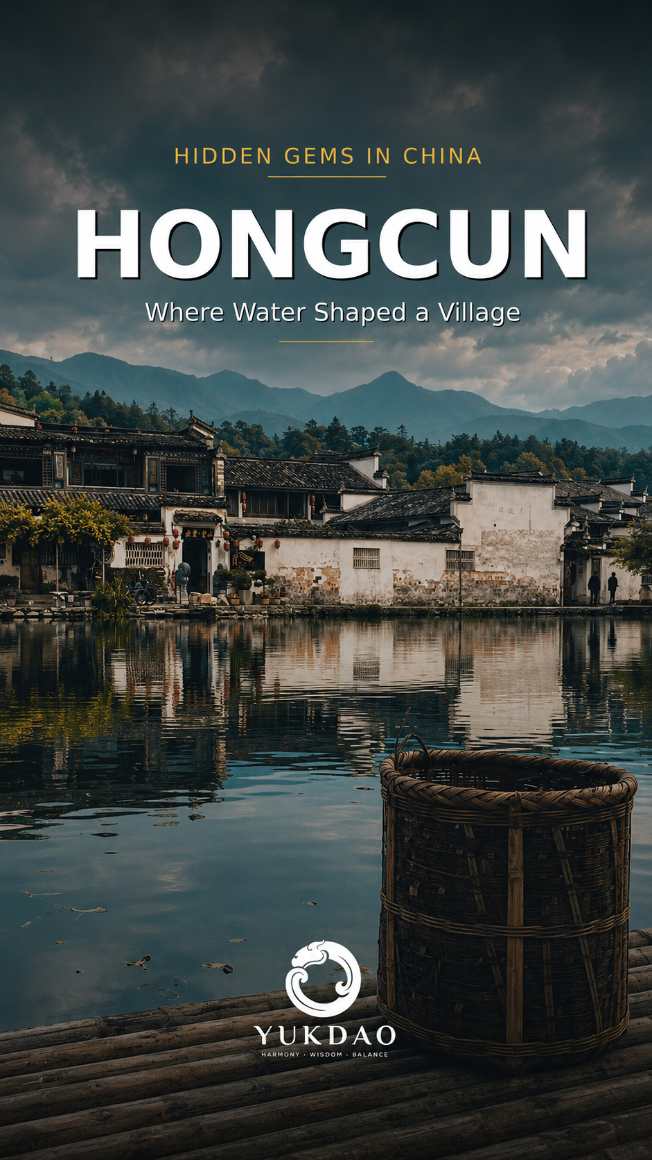 Hongcun's white Huizhou houses and dark tiled roofs reflected in calm water beneath misty mountains in Anhui, China.